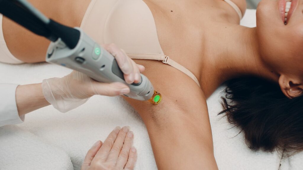 Underarm hair removal of a woman.